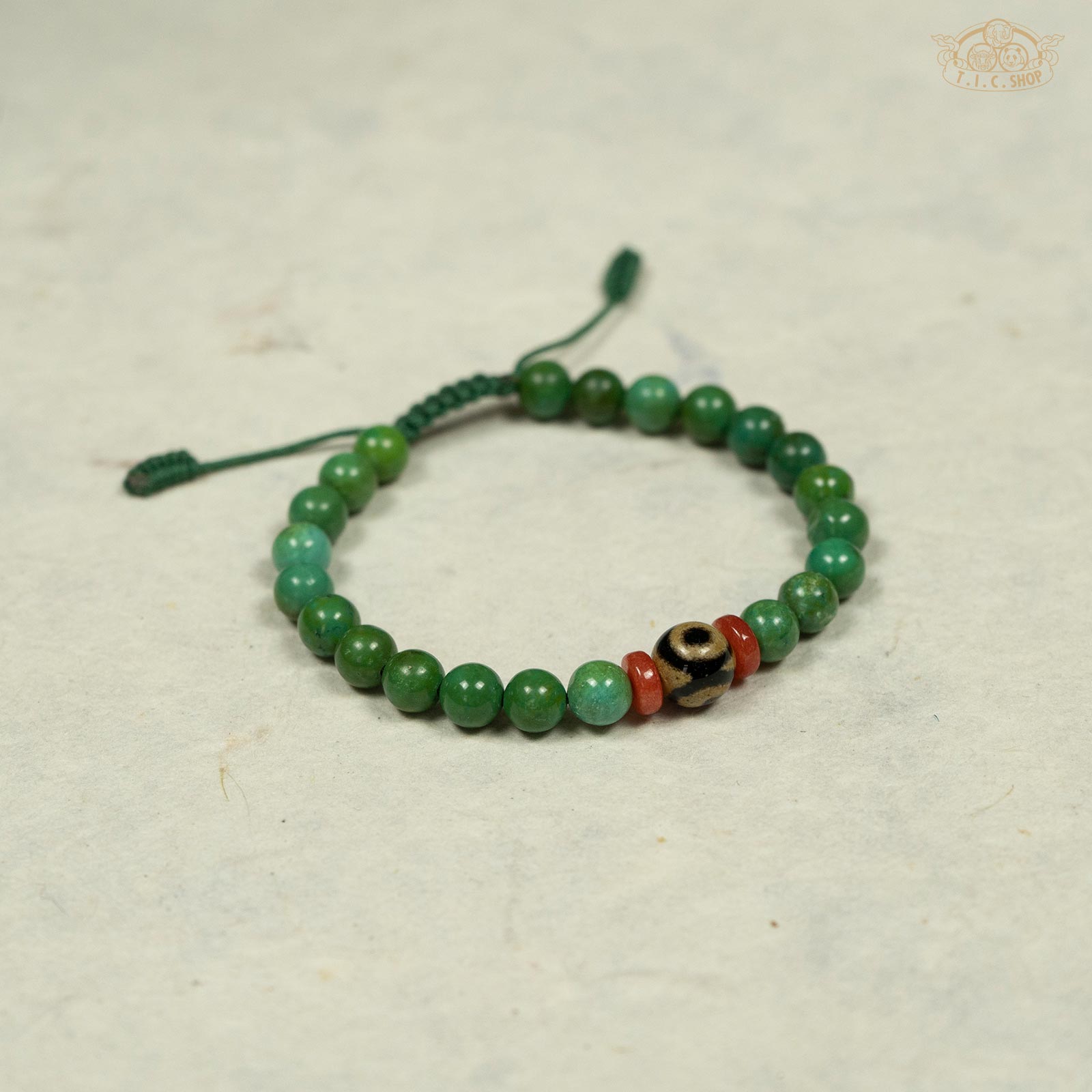 Dzi Bead Enhanced Turquoise 6mm Beads Bracelet