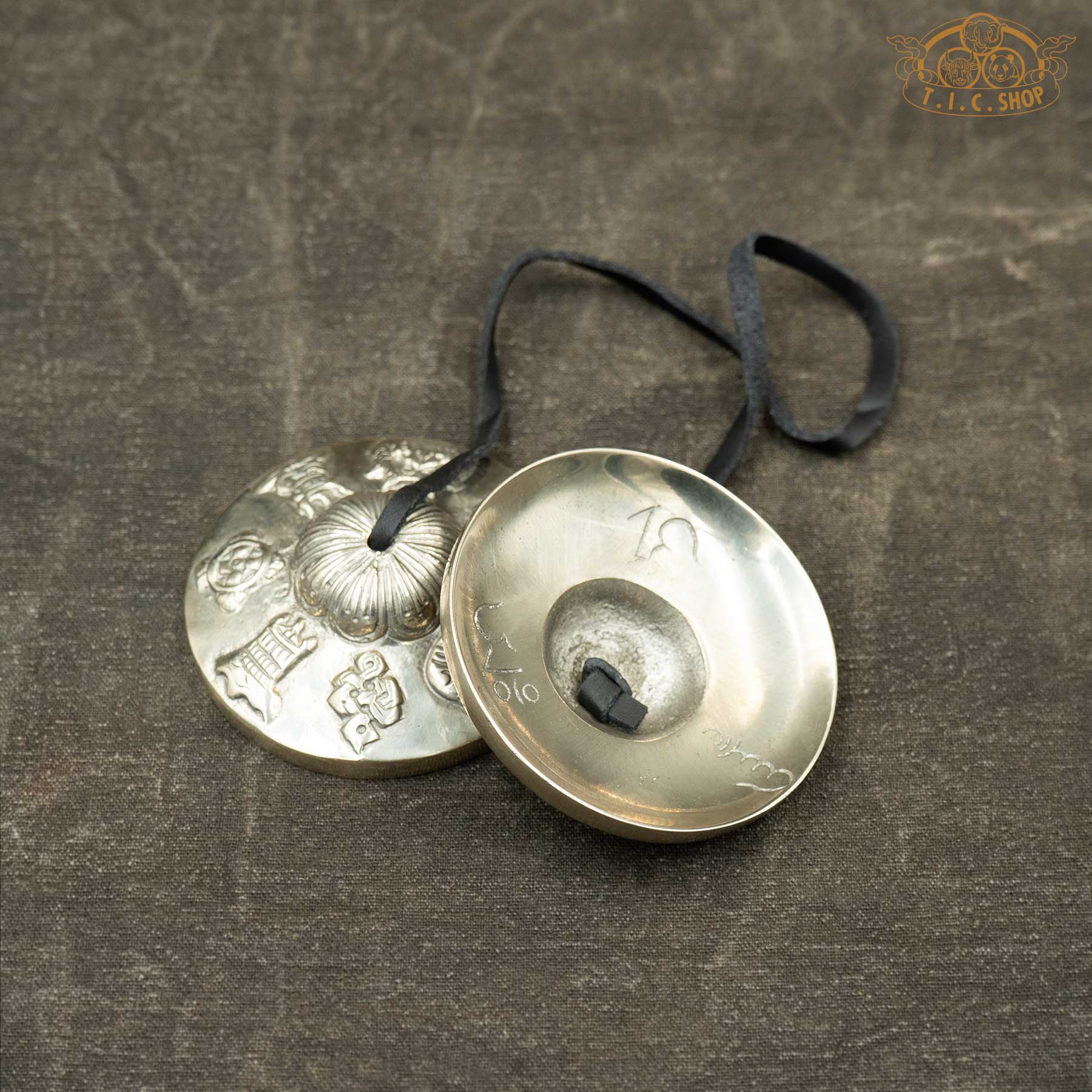 Reverse side of Eight Auspicious Symbols Tibetan Tingsha Meditation Bells 7.5cm with Om Ah Hum mantra