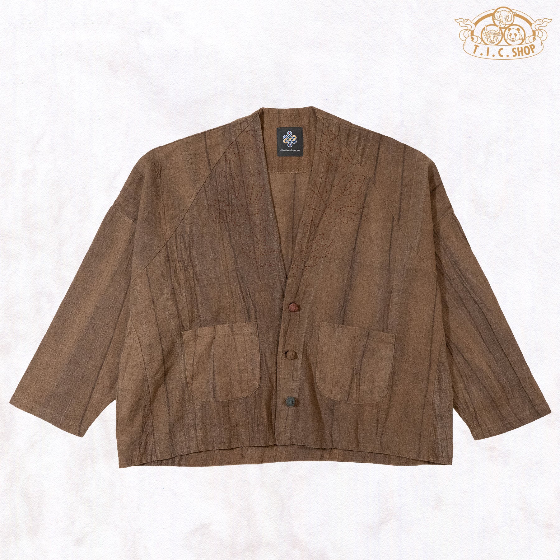 Front view of a brown hand-dyed Linen Zen cardigan with wide batwing sleeves and an oversized fit