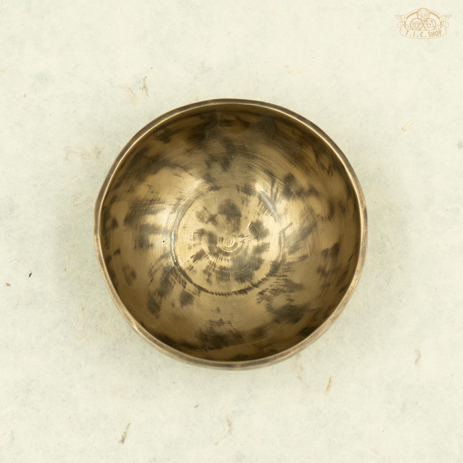 Top view of antique singing bowl made of brass, handcrafted in Nepal, for meditation
