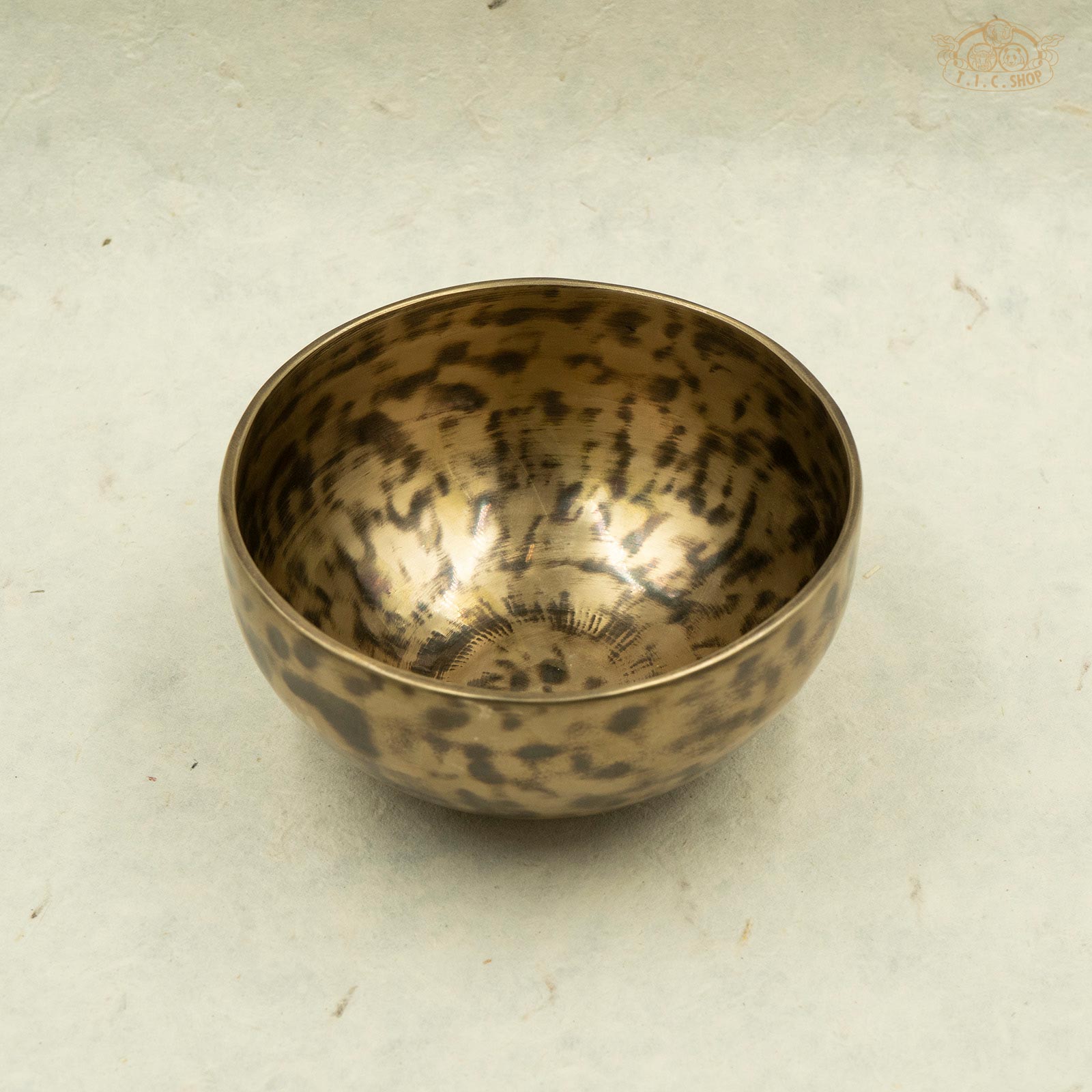 A handcrafted brass singing bowl made by Nepalese artisans, Showcasing the antique color.