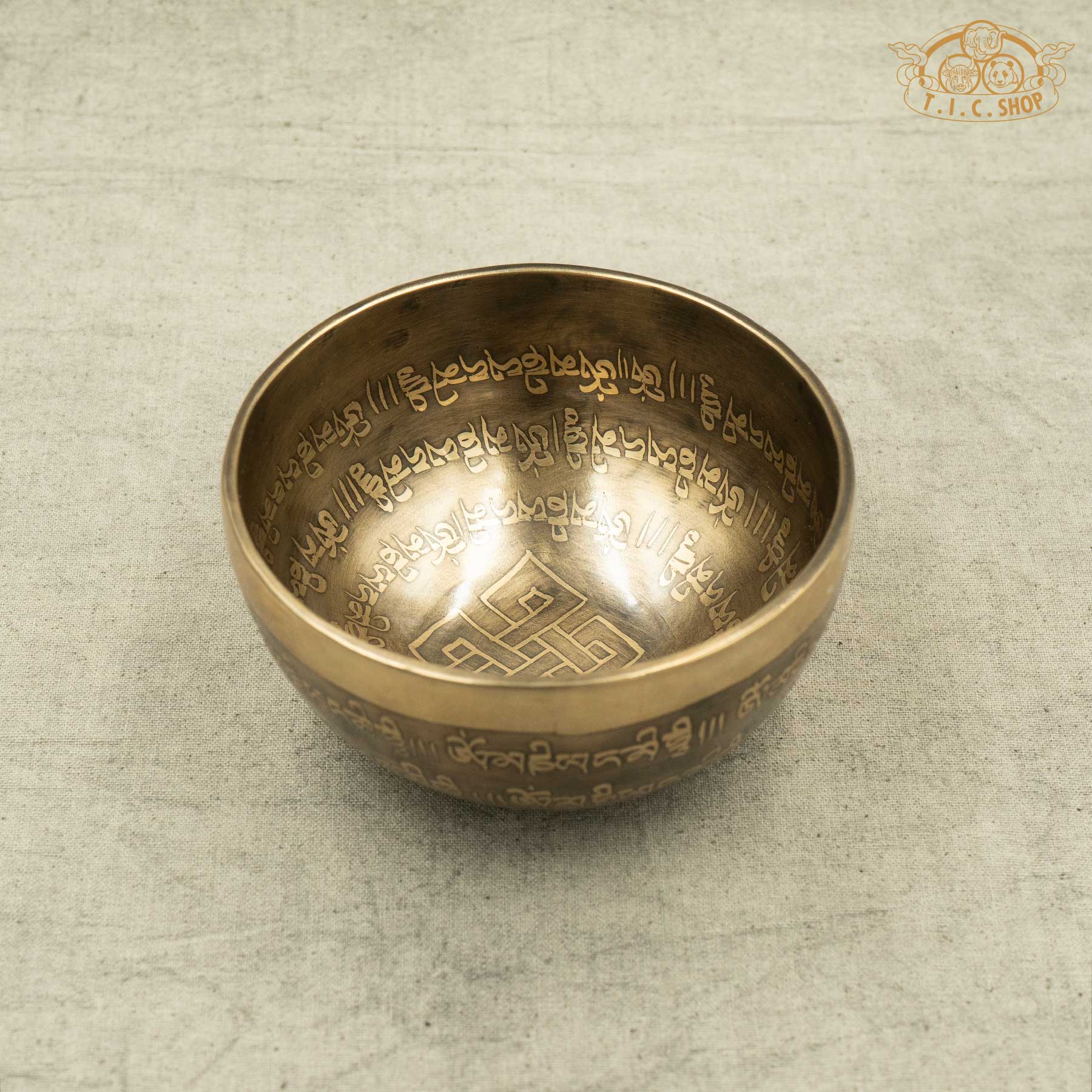 Front view of Endless Knot Tibetan singing bowl with engraved endless knot pattern,OM MANI PADME HUM Mantras, handmade in Nepal for meditation and spiritual practice
