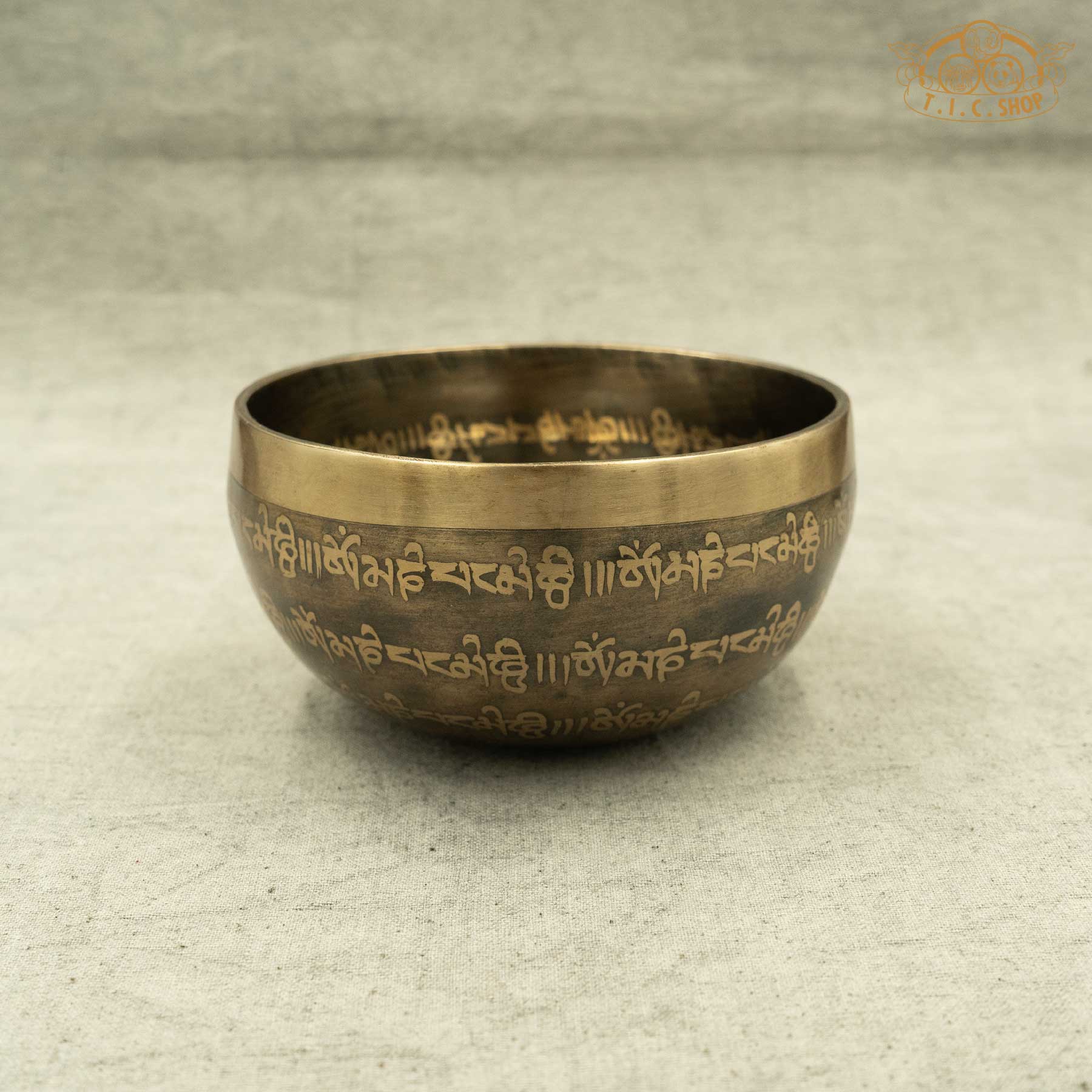 Side view of Tibetan Singing Bowl with Endless Knot Symbol, handmade in Nepal for meditation and spiritual practice