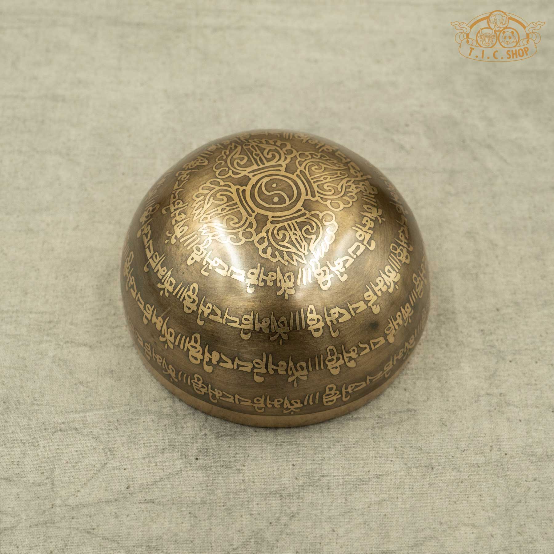 Back view of Brass Tibetan singing bowl with Double Vajra and Yin-Yang patterns ,OM MANI PADME HUM Mantras. Handmade by Nepalese artisans for meditation and spiritual practice