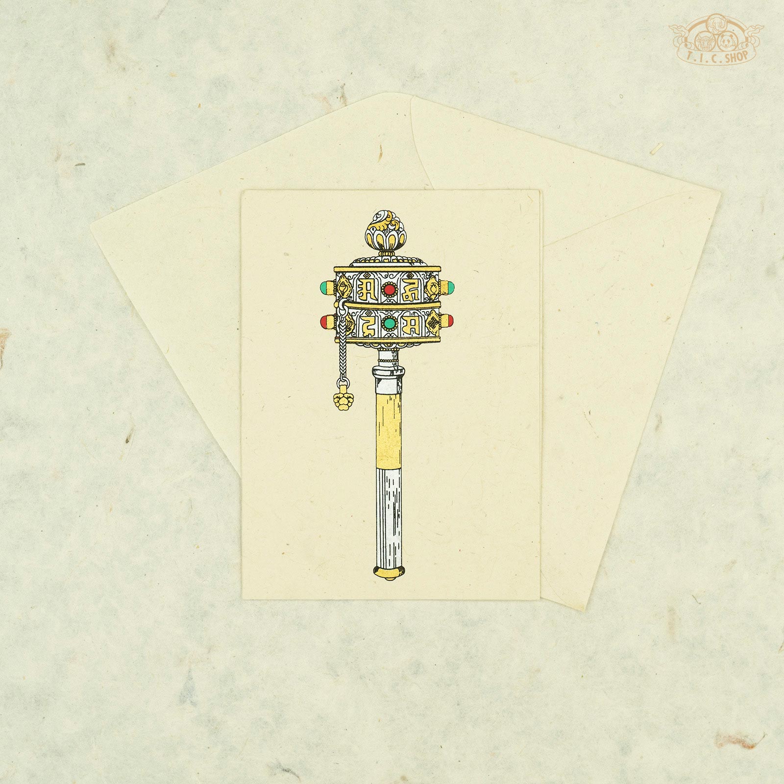 Handmade Nepalese Lokta paper greeting card with Tibetan Prayer Wheel symbol for blessings and spiritual décor