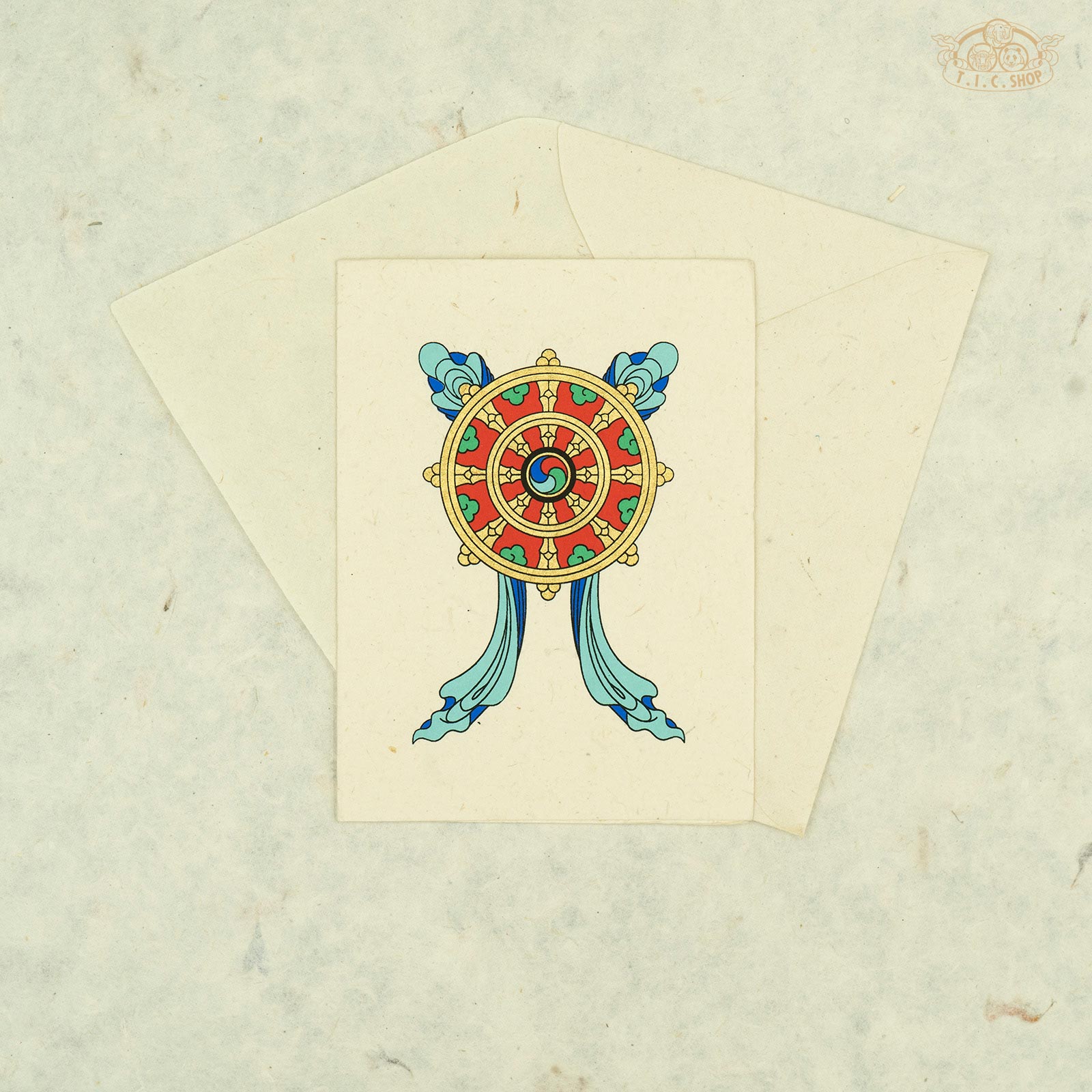Handmade Nepalese Lokta paper greeting card with Tibetan Dharma Wheel symbol for blessings and spiritual décor