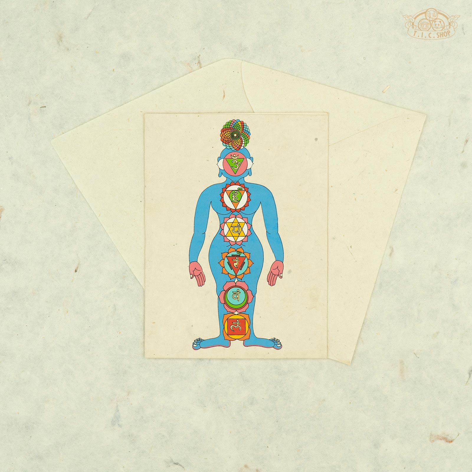 Handmade Nepalese Lokta paper greeting card featuring traditional chakra symbols representing balance and spiritual energy