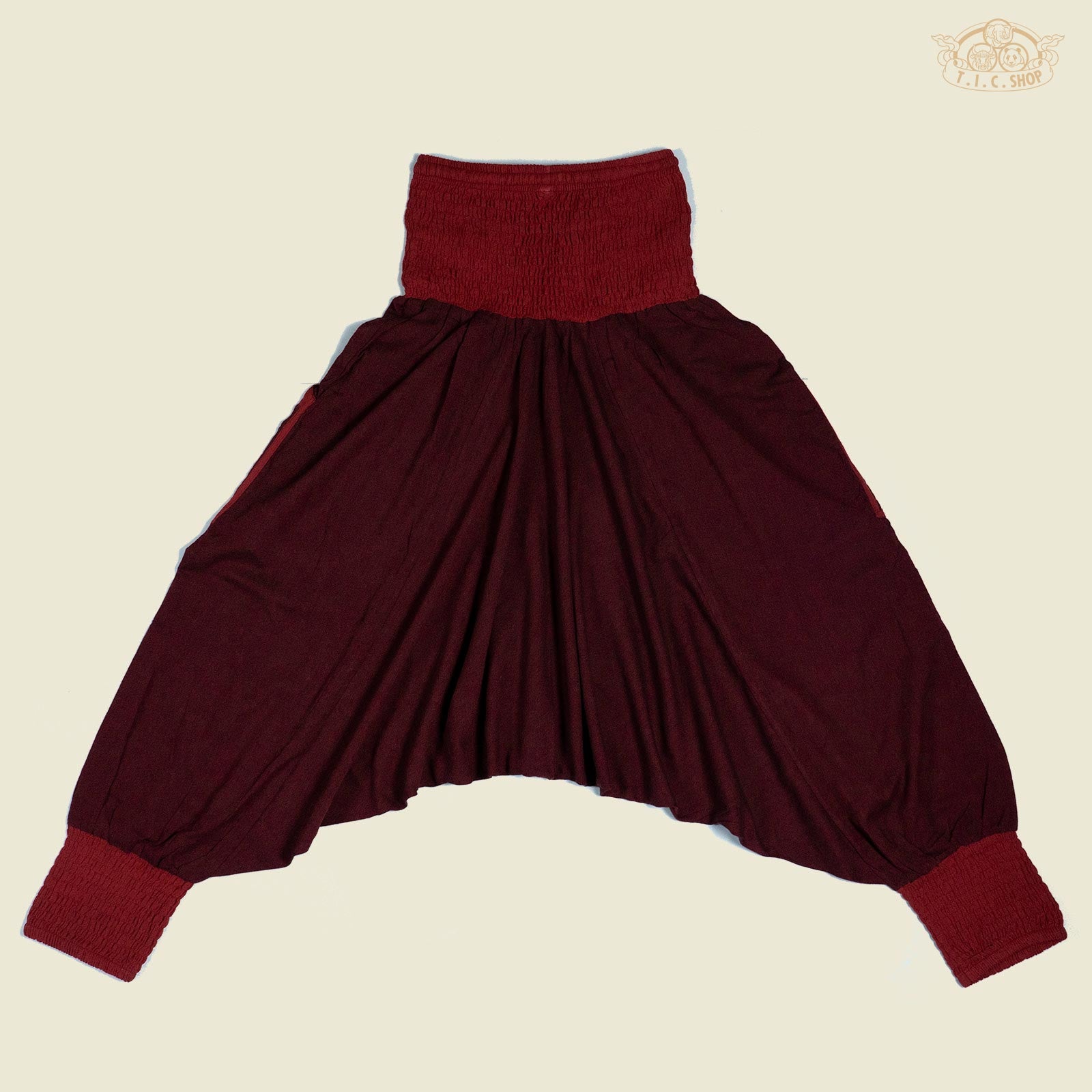 Back view of cotton yoga trousers showing relaxed fit and elastic cuffs.