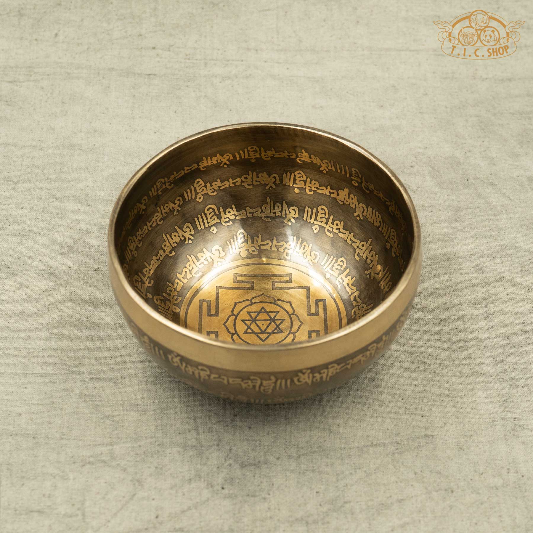 Handmade Tibetan singing bowl from Nepal with carved OM MANI PADME HUN mantra and Mandala pattern for meditation and healing