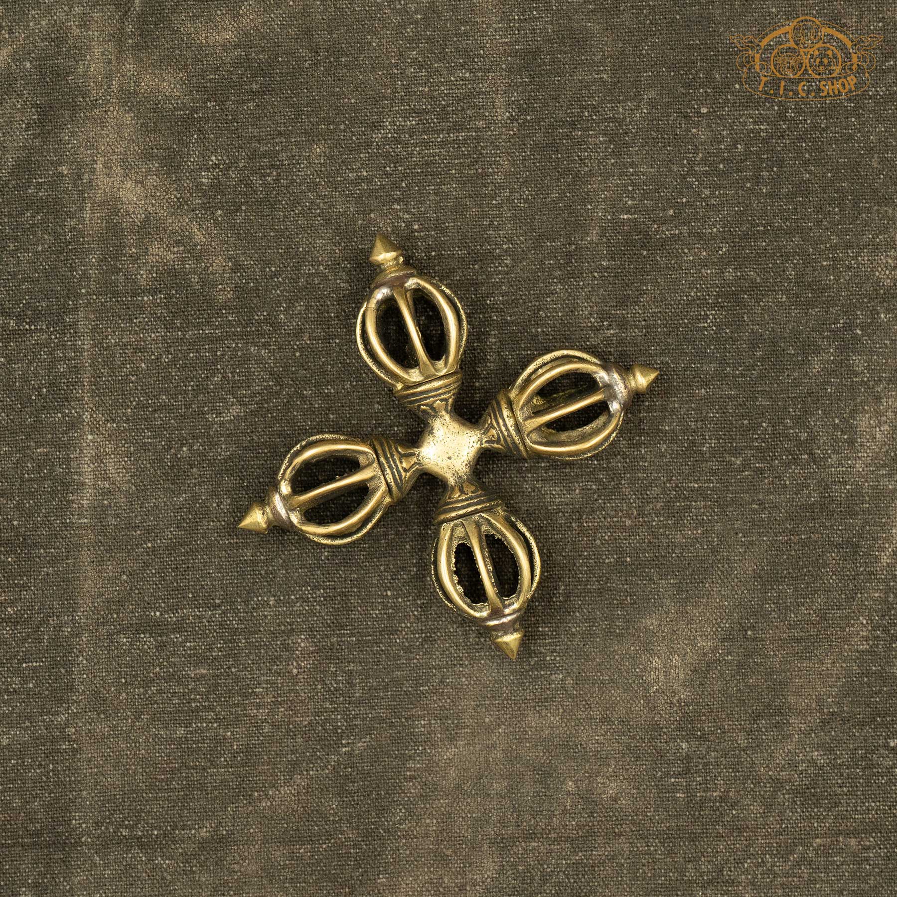 Brass Tibetan Nine-Pronged Double Vajra Dorje handmade by Himalayan artisans, symbol of stability and enlightenment