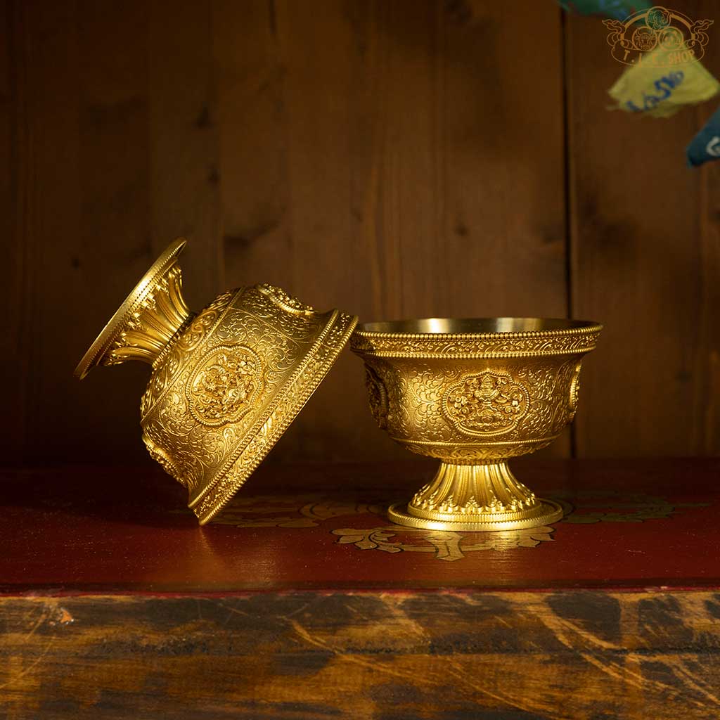 Close-up detail of Eight Auspicious Symbols engraving on high-quality brass Tibetan offering bowl_Ø 10 cm