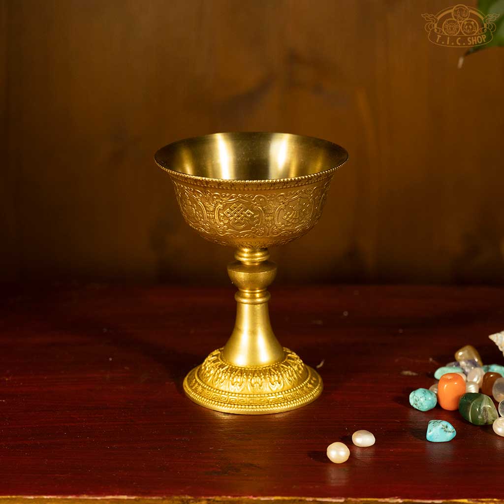Top view of Tibetan brass butter lamp, highlighting the circular opening and ornate Tibetan patterns.