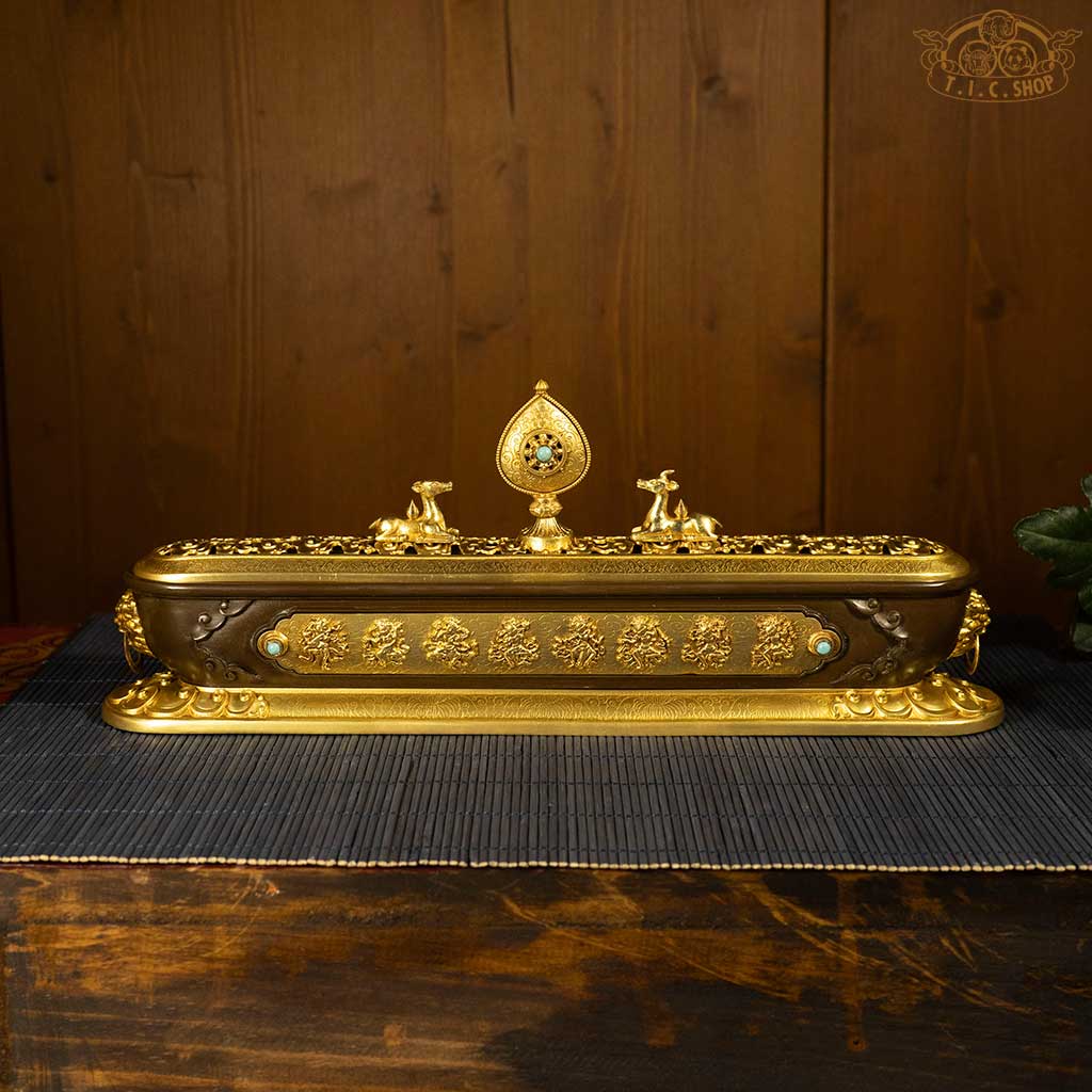 Back view of incense burner displaying Eight Heavenly Maidens and artistic brass detailing.