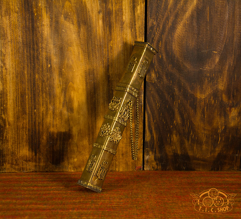 Front view of Tibetan brass incense case with engraved 8 Auspicious Symbols and Kalachakra motifs, antique finish.