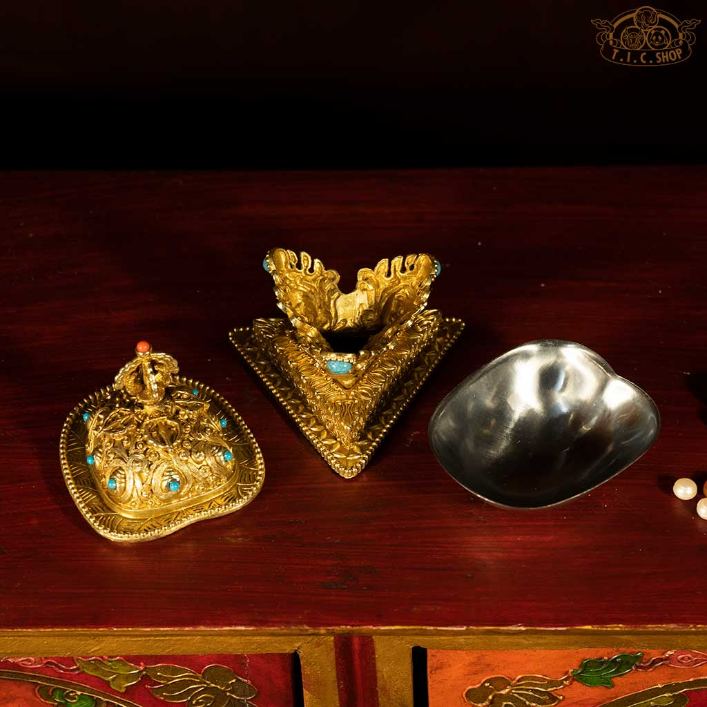 Tibetan Buddhist Kapala with intricate details, brass and stainless steel ritual object for altar offerings and spiritual practice.