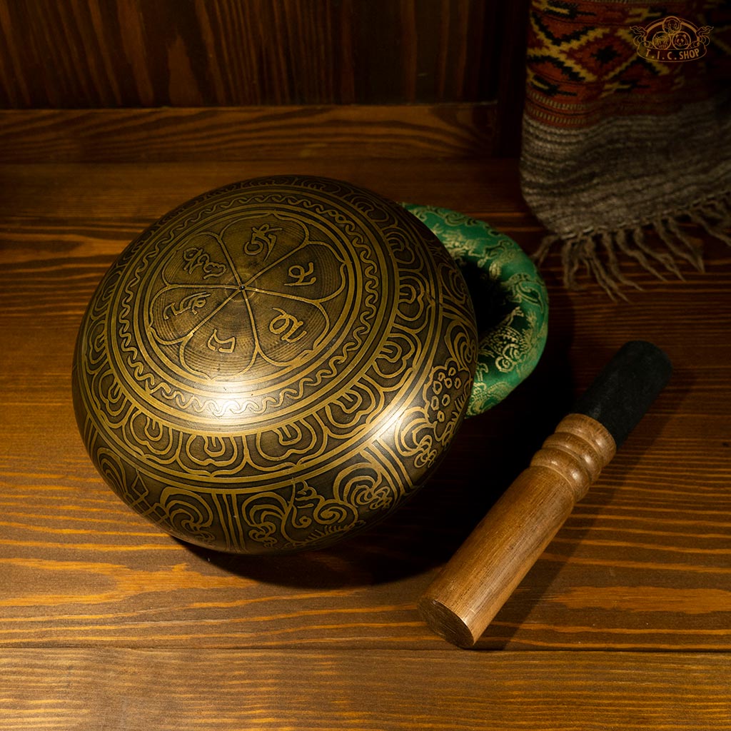 Back view of the brass singing bowl, highlighting its rounded exterior