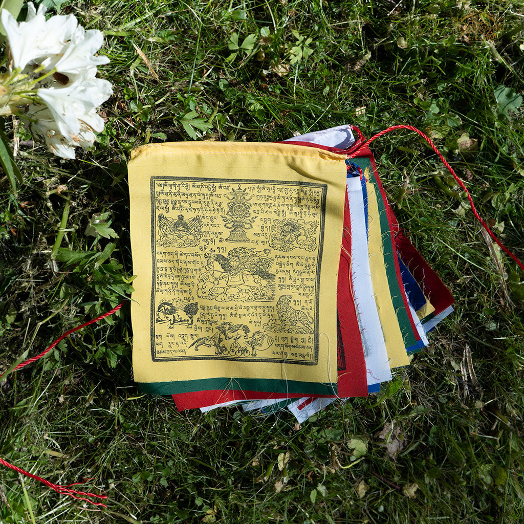 Colorful Tibetan Windhorse prayer flags made of cotton, used for blessing and spiritual practices