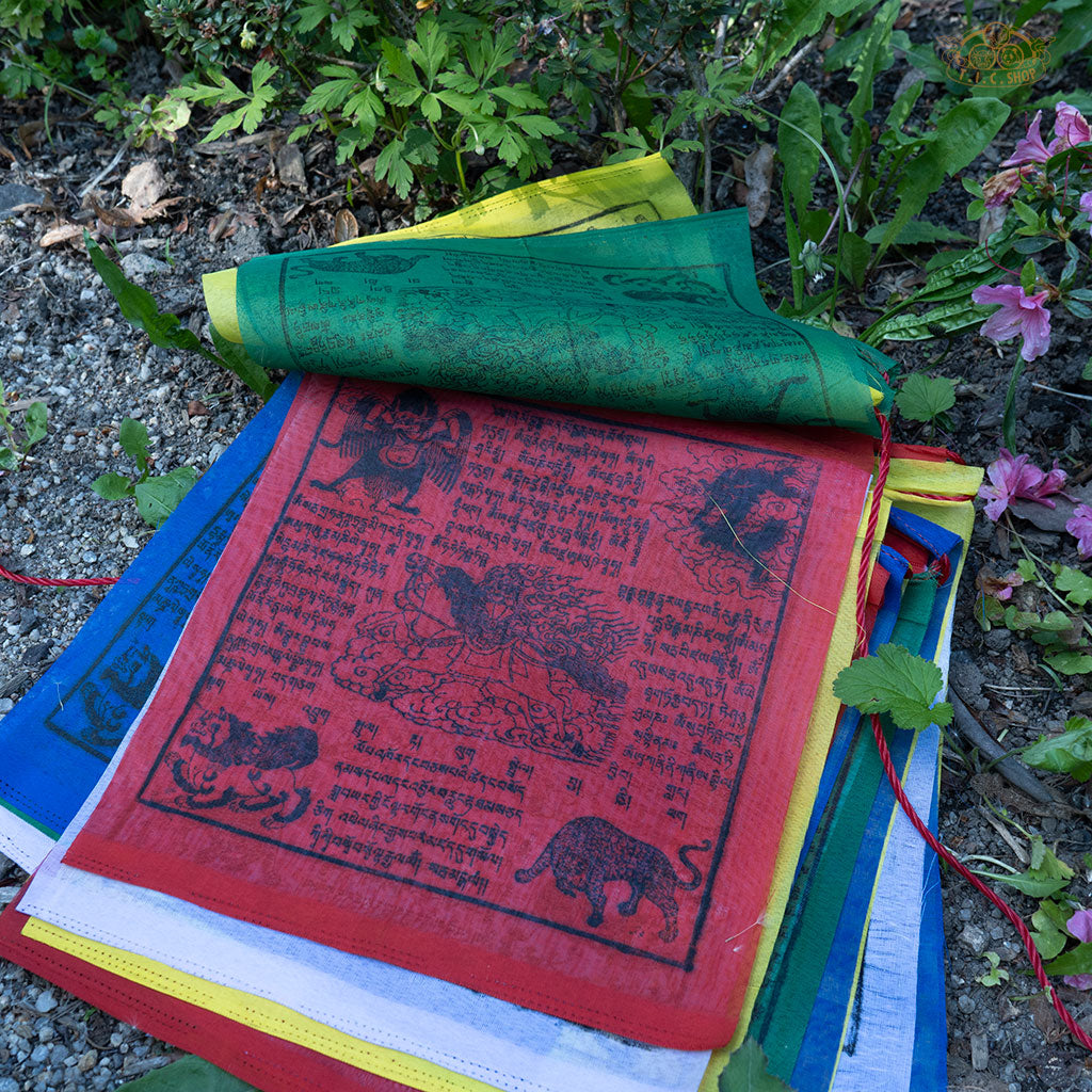 Detailed view of vibrant Tibetan Windhorse prayer flags made from polyester with traditional printed designs