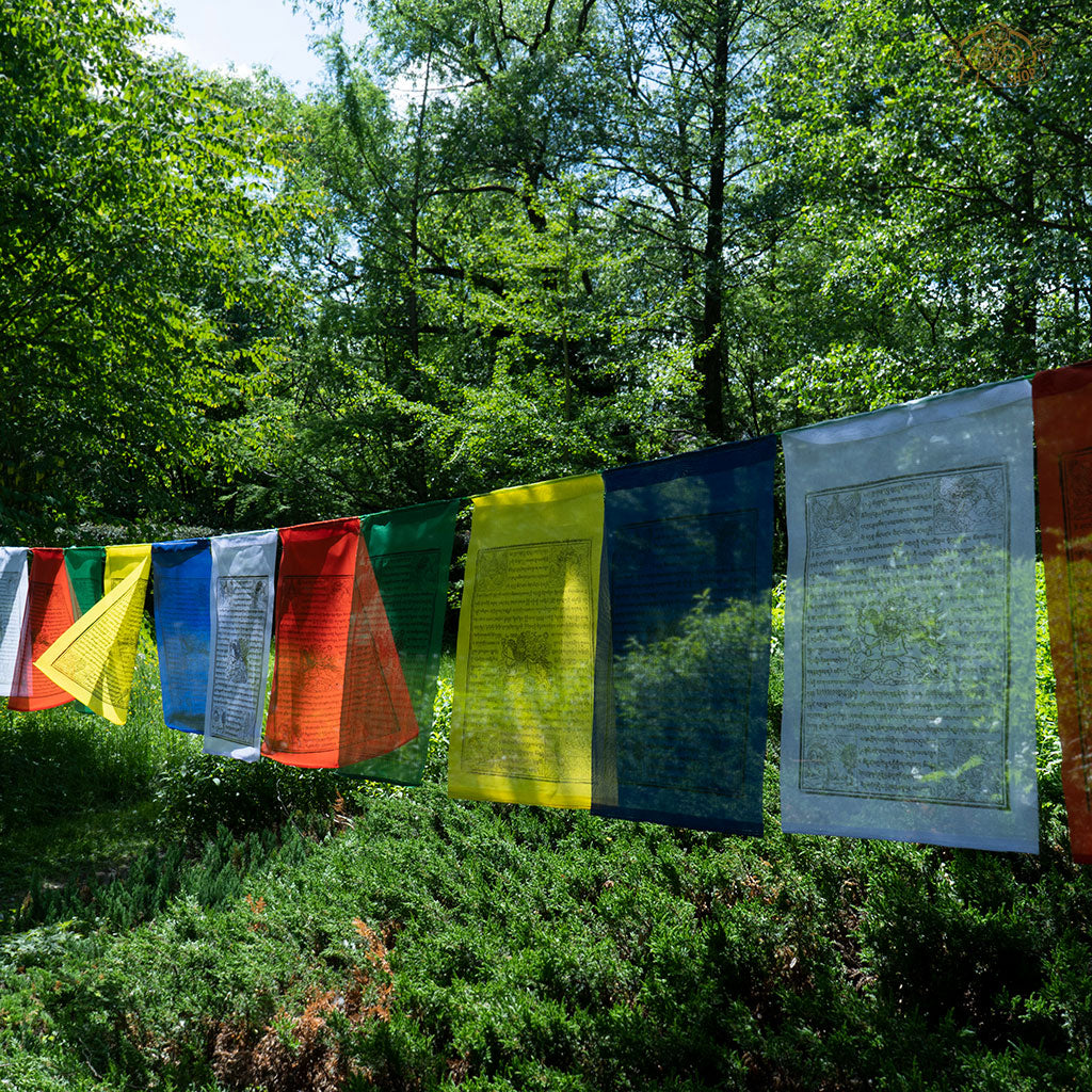 Long string of 25 hand-printed polyester Windhorse prayer flags, each 35x45 cm, promoting spiritual harmony and luck
