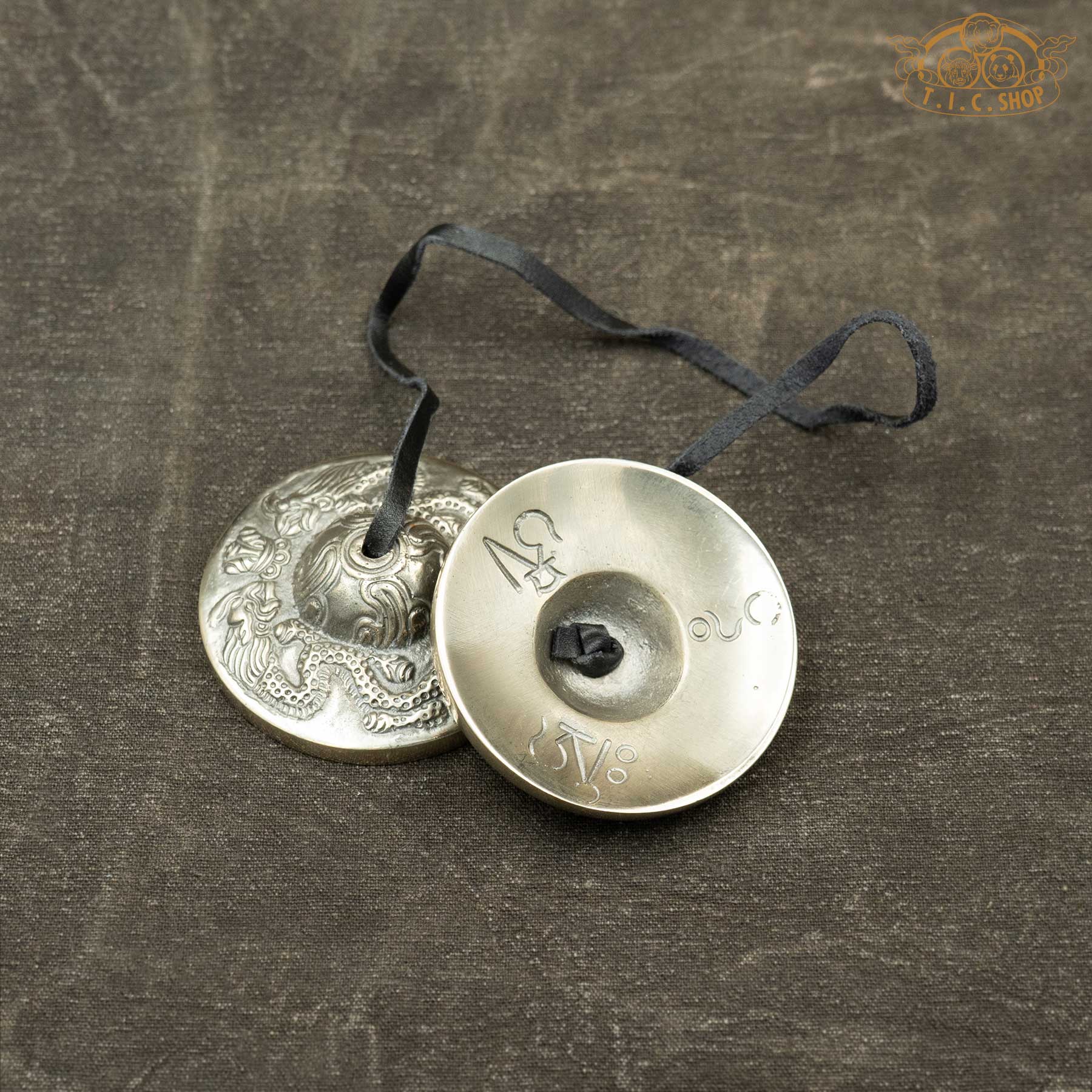 Reverse side of Dragon Motif Tibetan Tingsha Meditation Bells 6.8cm with Om Ah Hum mantra