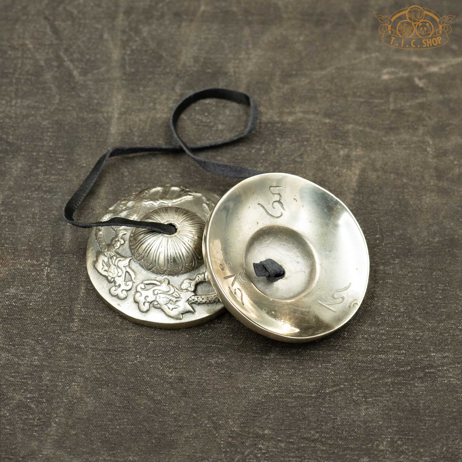 Reverse side of Dragon Motif Tibetan Tingsha Meditation Bells 7.5cm with Om Ah Hum mantra