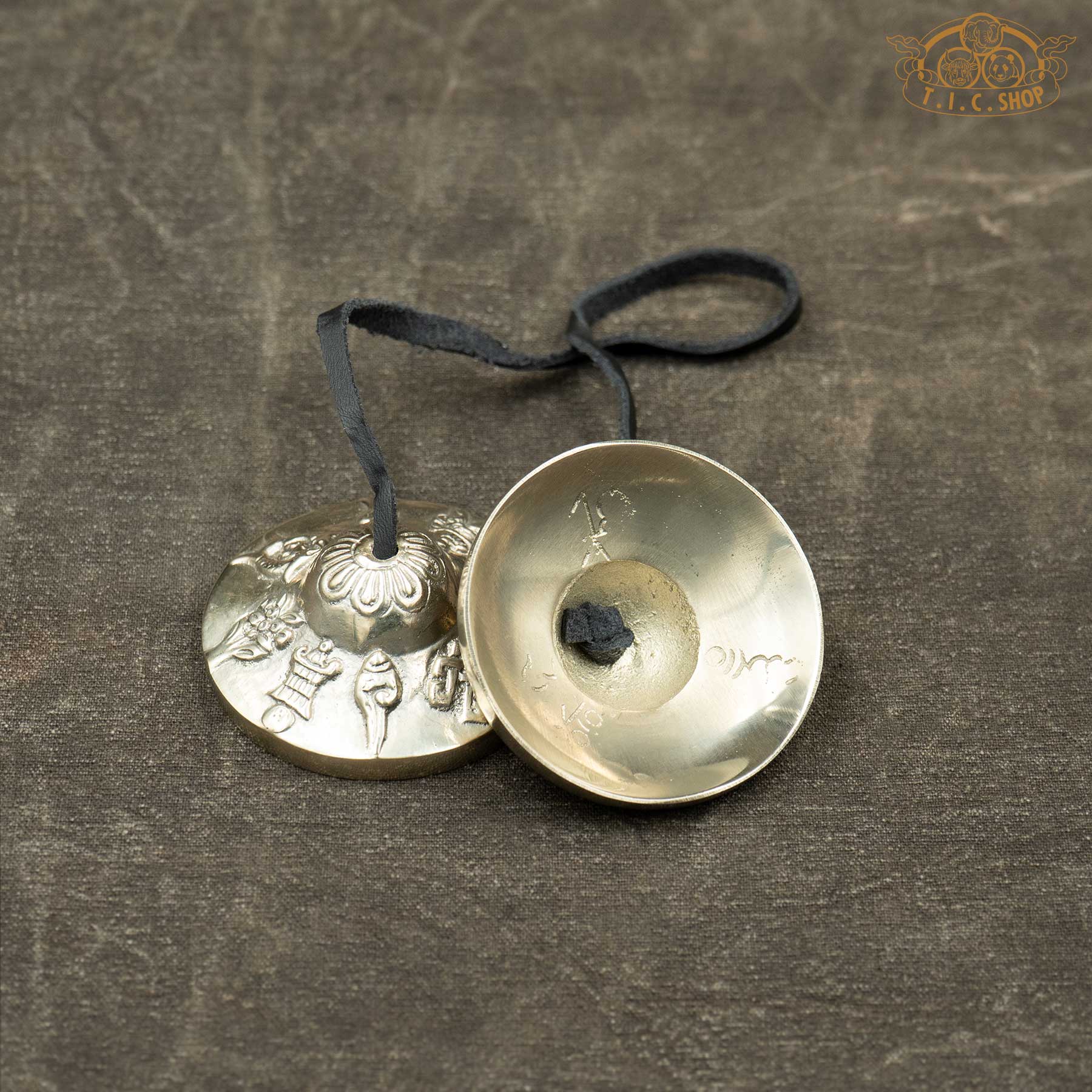Reverse side of Eight Auspicious Symbols Tibetan Tingsha Meditation Bells 6.5cm with Om Ah Hum mantra