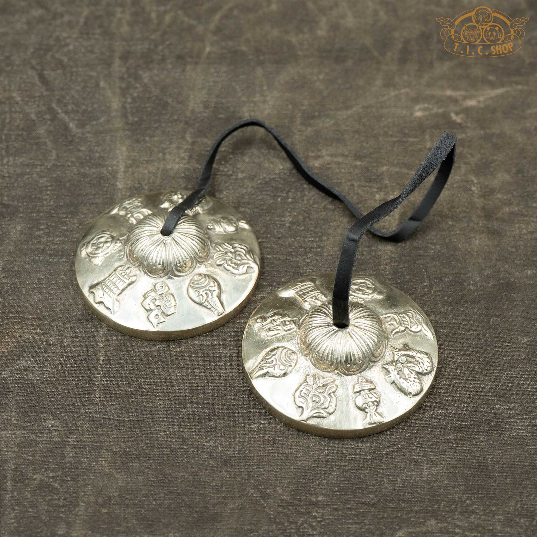 Front view of Eight Auspicious Symbols Tibetan Tingsha Meditation Bells 7.5cm