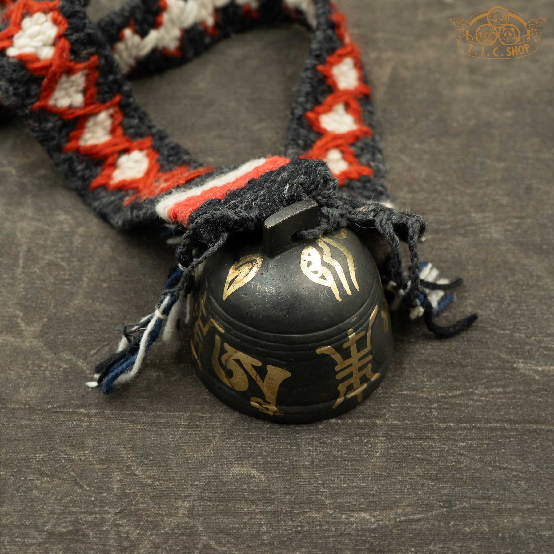 Top View of Handmade Himalayan Antique Bronze Yak Bell Small with Om Ah Hum and Buddha Eyes