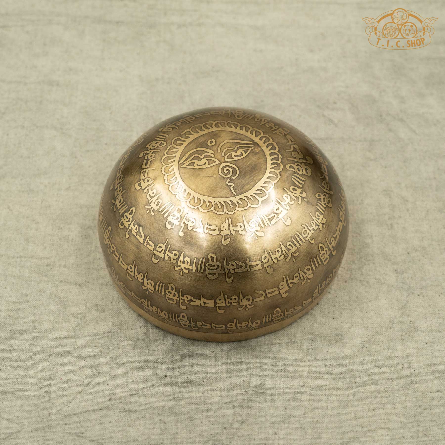 Back view of Brass Tibetan singing bowl with Buddha Eyes Symbol and OM MANI PADME HUM Mantras,handmade by Nepalese artisans for meditation 