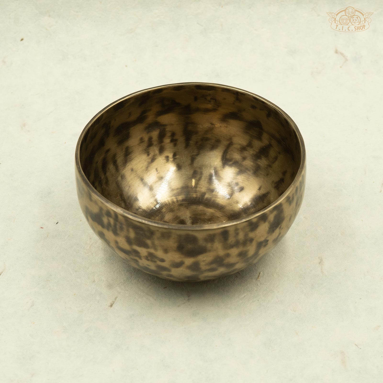 Front view of Tibetan antique singing bowl made of brass, handcrafted in Nepal, for meditation