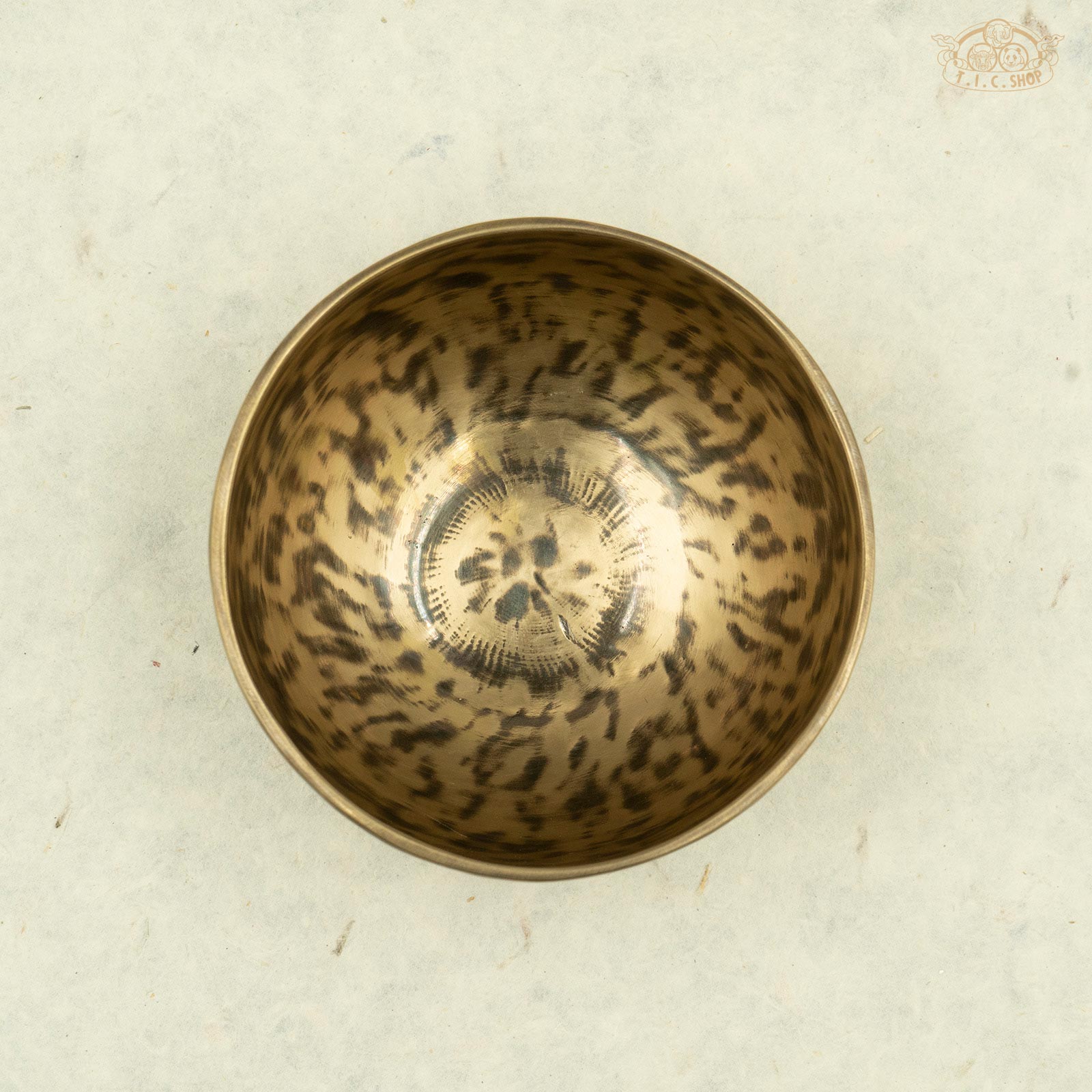 Top of a handcrafted brass singing bowl made by Nepalese artisans, Showcasing the antique color.