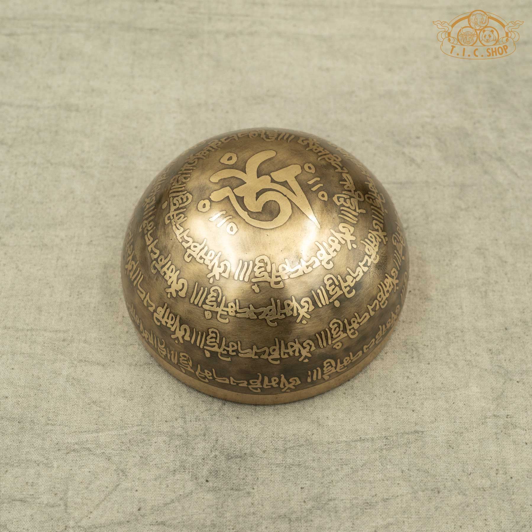 Back view of Tibetan Singing Bowl with OM symbol and OM MANI PADME HUM Mantras， handmade in Nepal for meditation and spirtual practice