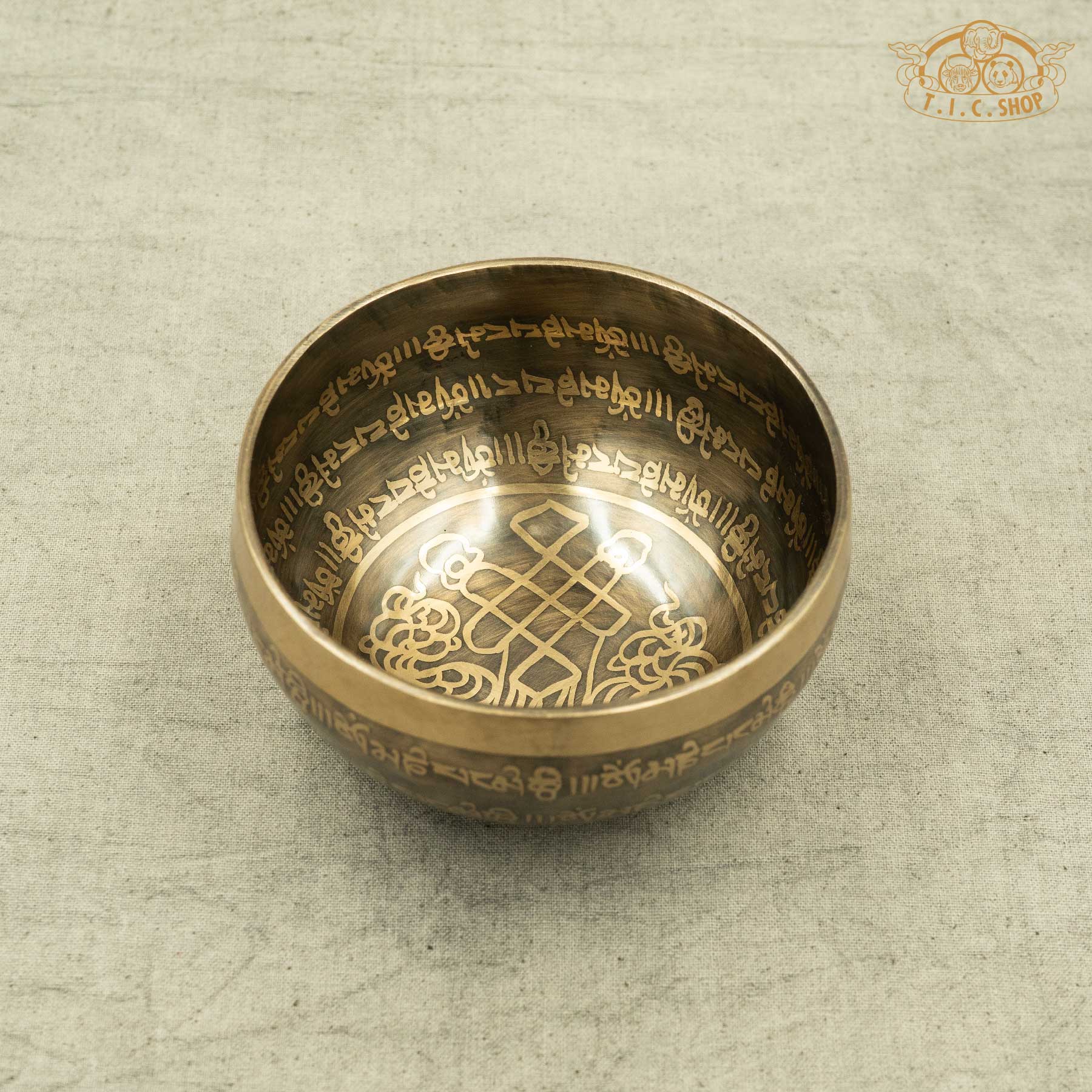 Front view view of Singing Bowl with Endless Knot Symbol, handmade in Nepal for meditation and spiritual practice