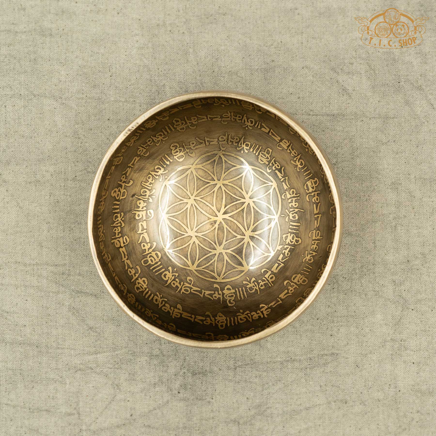 Brass Tibetan singing bowl with engraved designs and OM MANI PADME HUM Mantras,handmade by Nepalese artisans for meditation _Top view