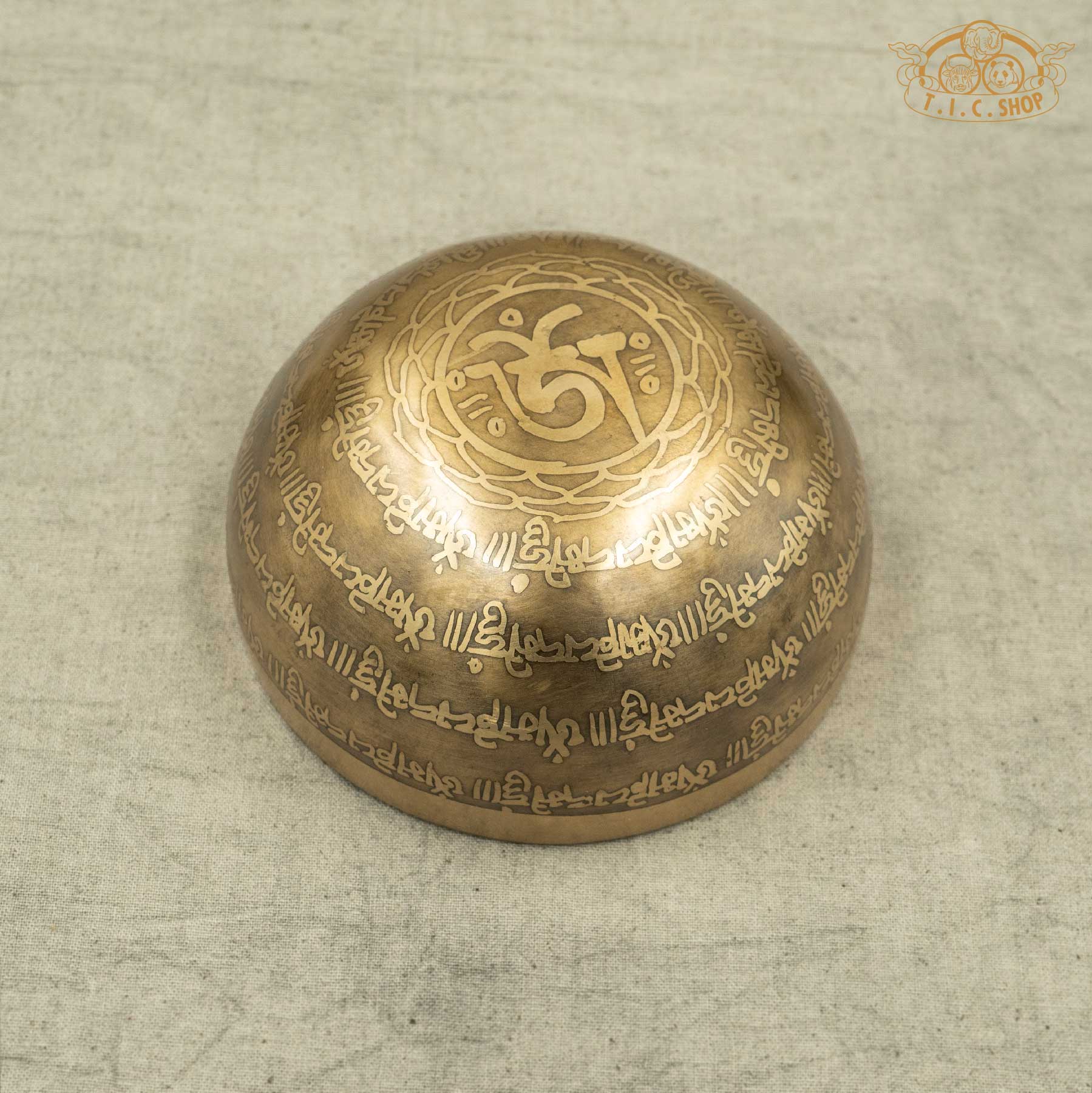 Back view of Tibetan Singing Bowl with Lotus Symbol and OM symble, handmade in Nepal for meditation and spiritual practice