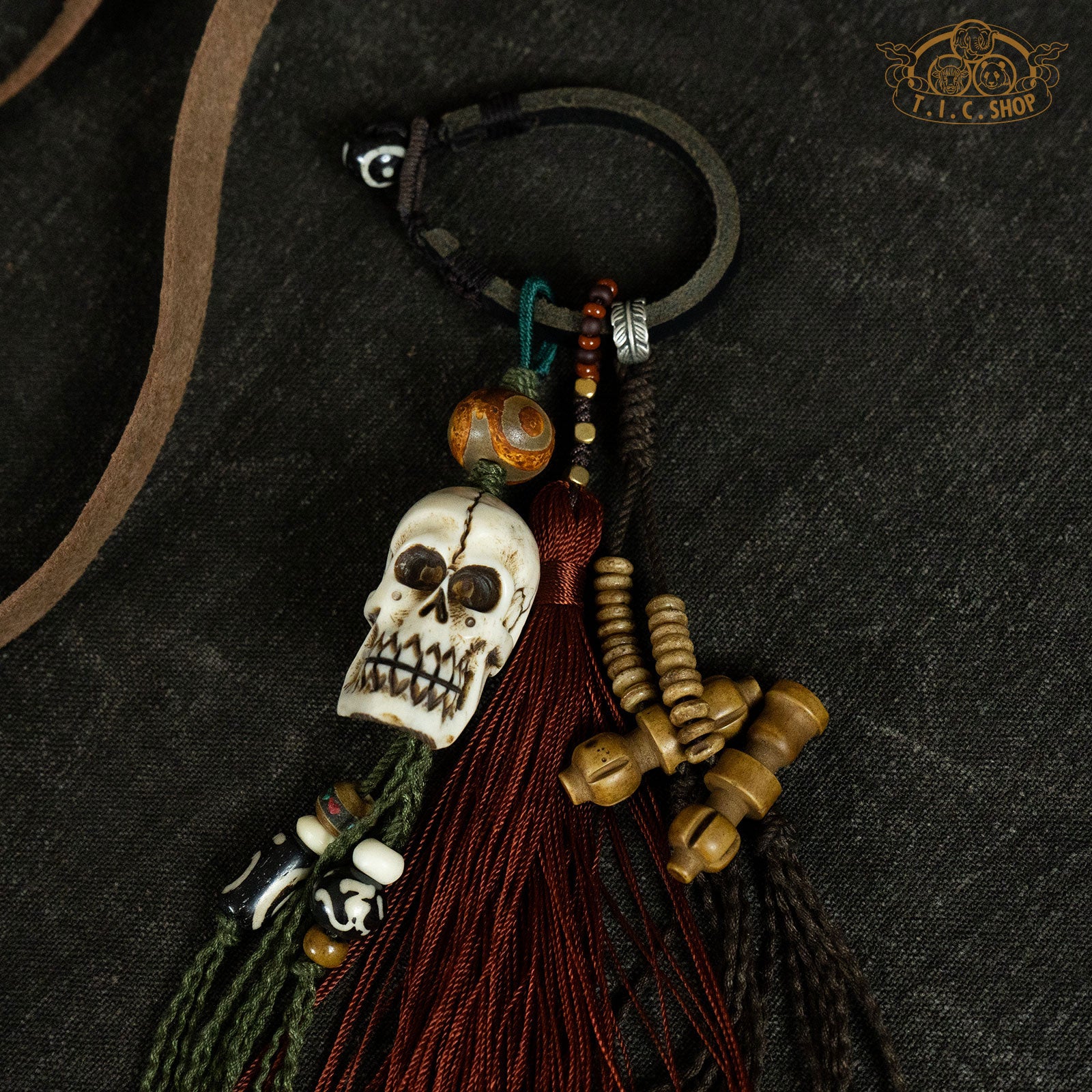 Tibetan Hand-Woven Hanging Amulet with hand-carved skull from yak bone
