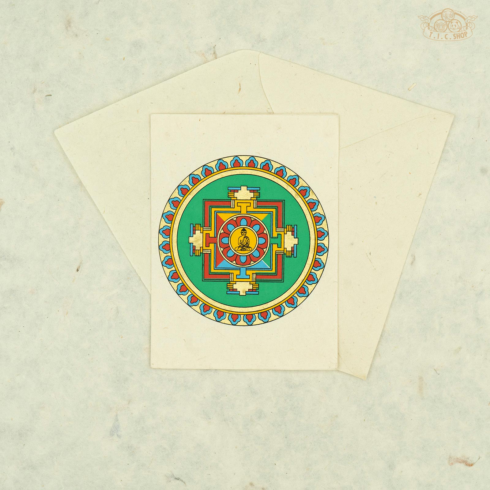 Handmade Nepalese Lokta paper greeting card featuring a traditional Tibetan mandala design symbolizing harmony and the universe