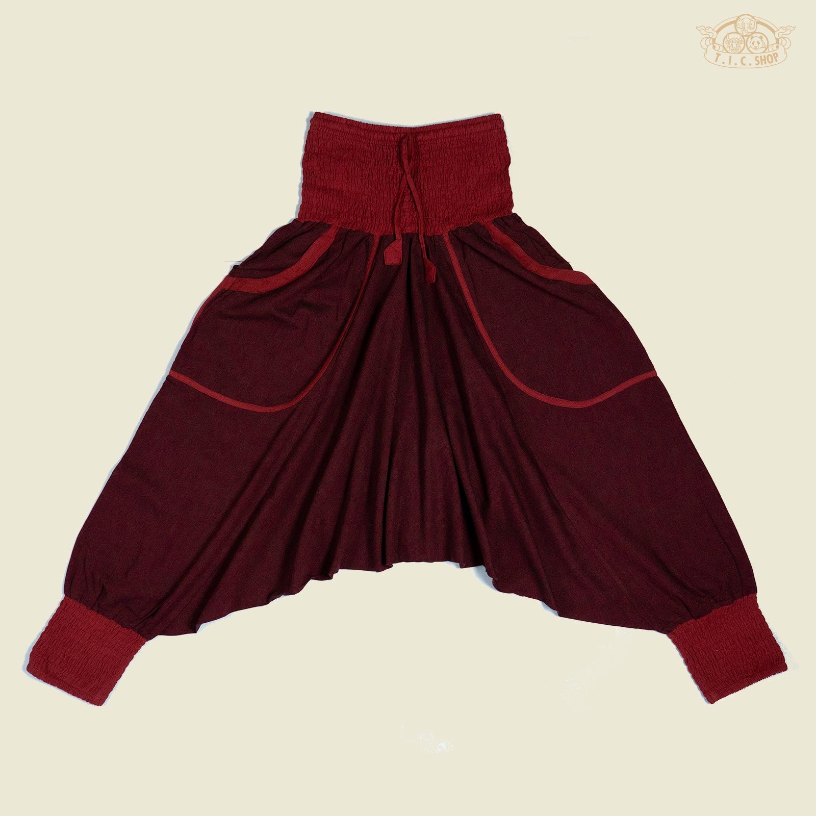 Front view of elastic waist yoga trousers with drawstring and patch pockets.