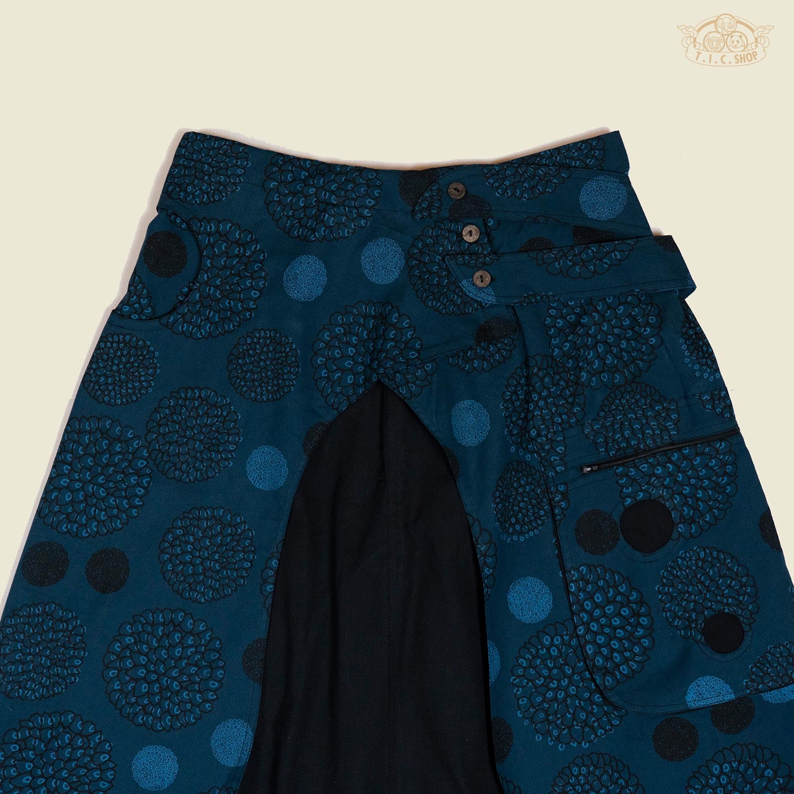 Detail of elastic cuff and cotton fabric texture on the trousers.

