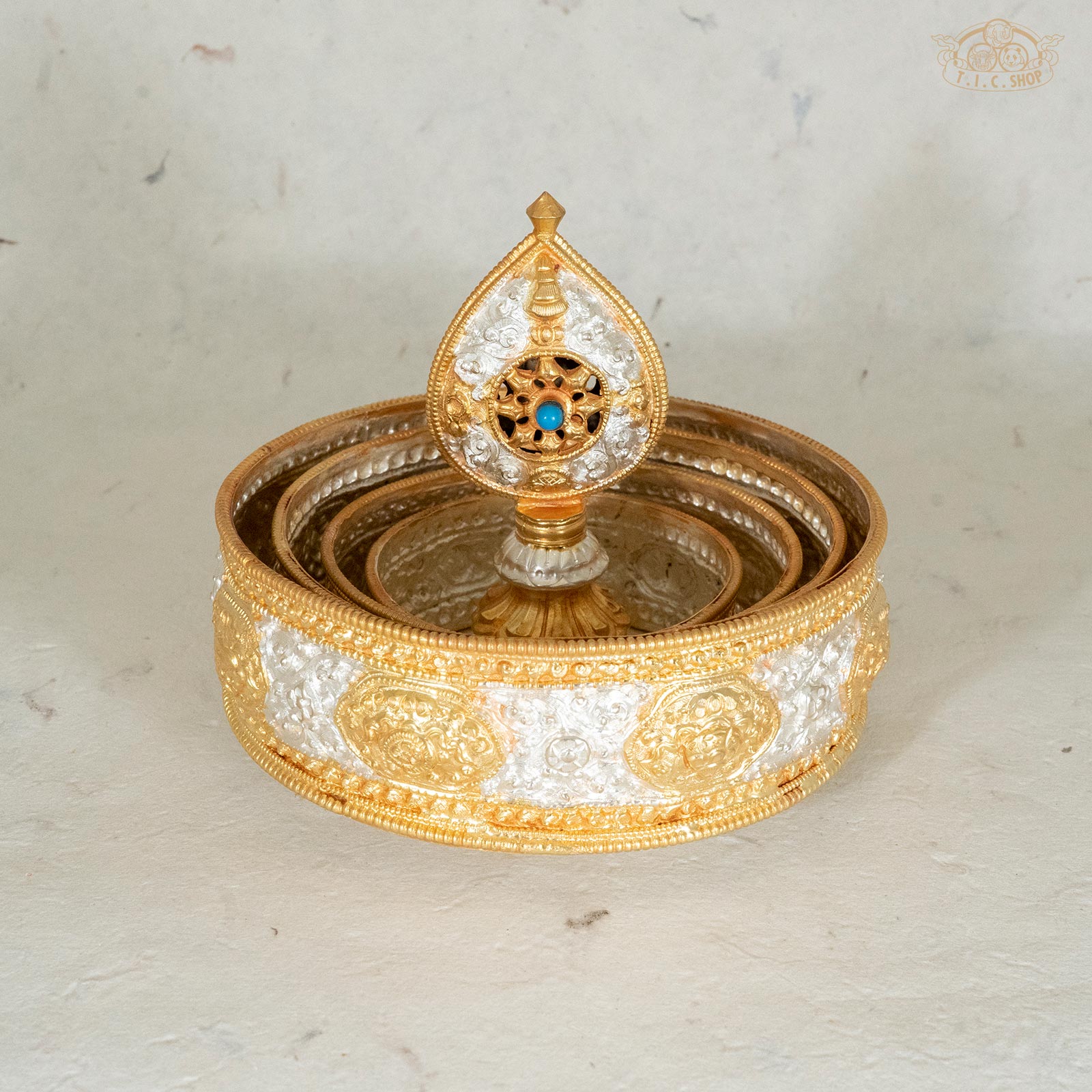 Handcrafted Tibetan mandala offering set made of brass and nickel silver with five stackable layers for altar use