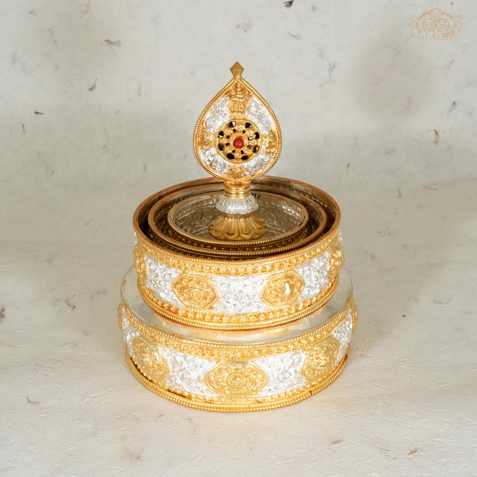 Brass and silver Tibetan mandala offering bowl set for meditation, shrine, and spiritual practice