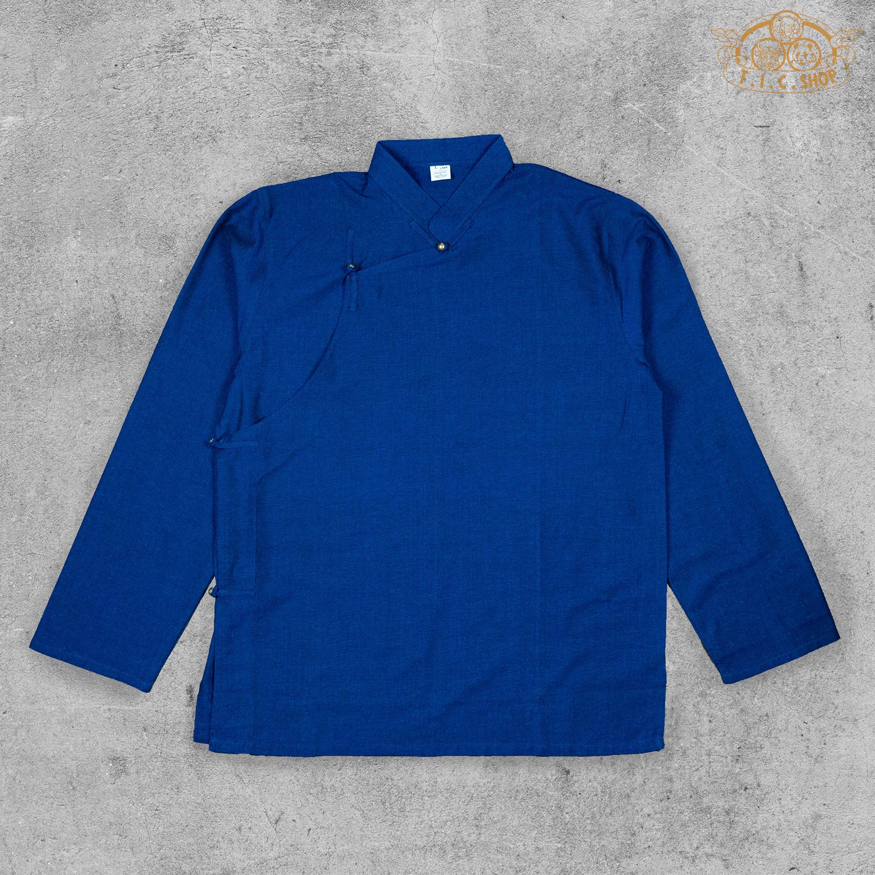 Front view of Tibetan-style cotton shirt in natural color, showcasing its traditional design and cut.