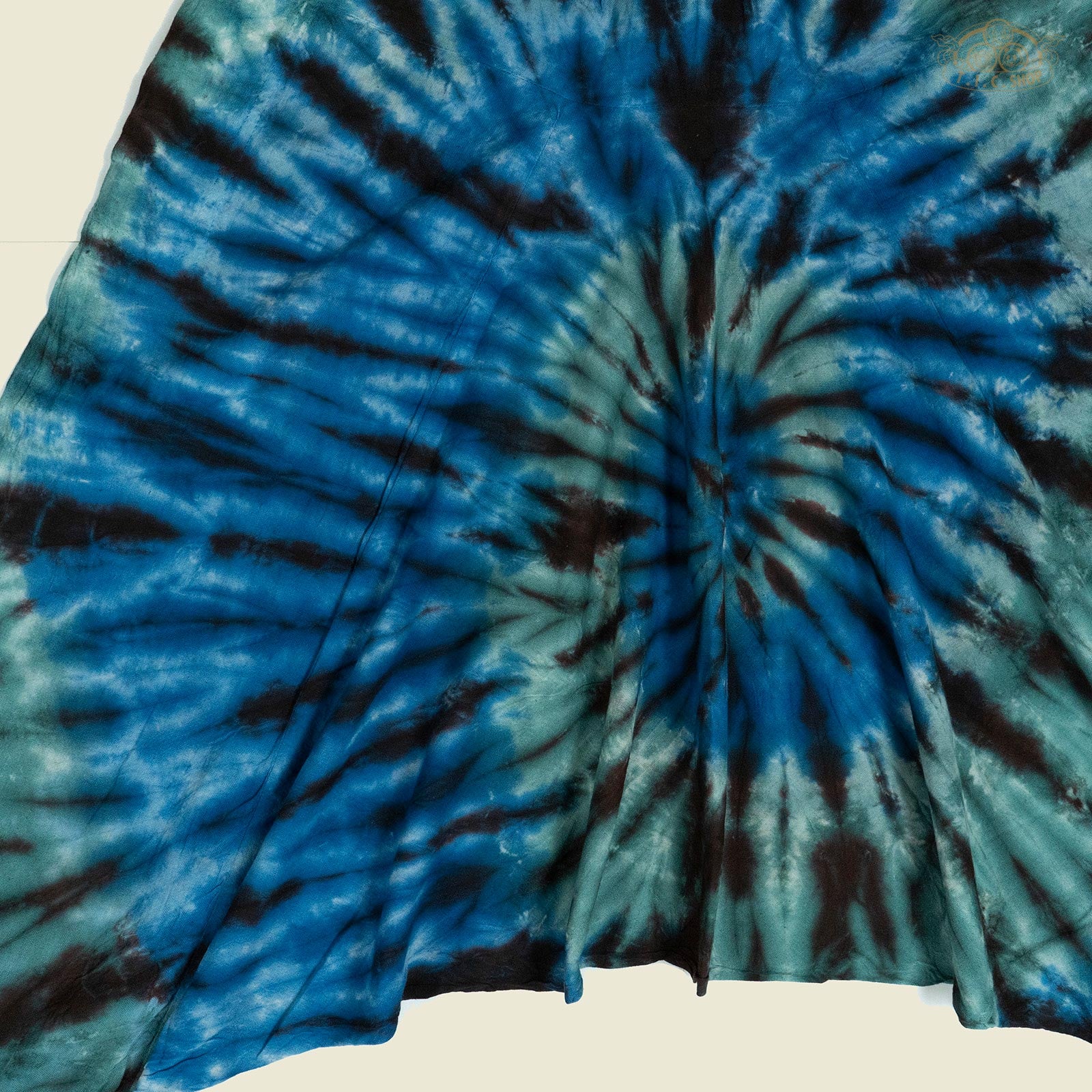 Close-up of the tie-dye cotton fabric pattern.