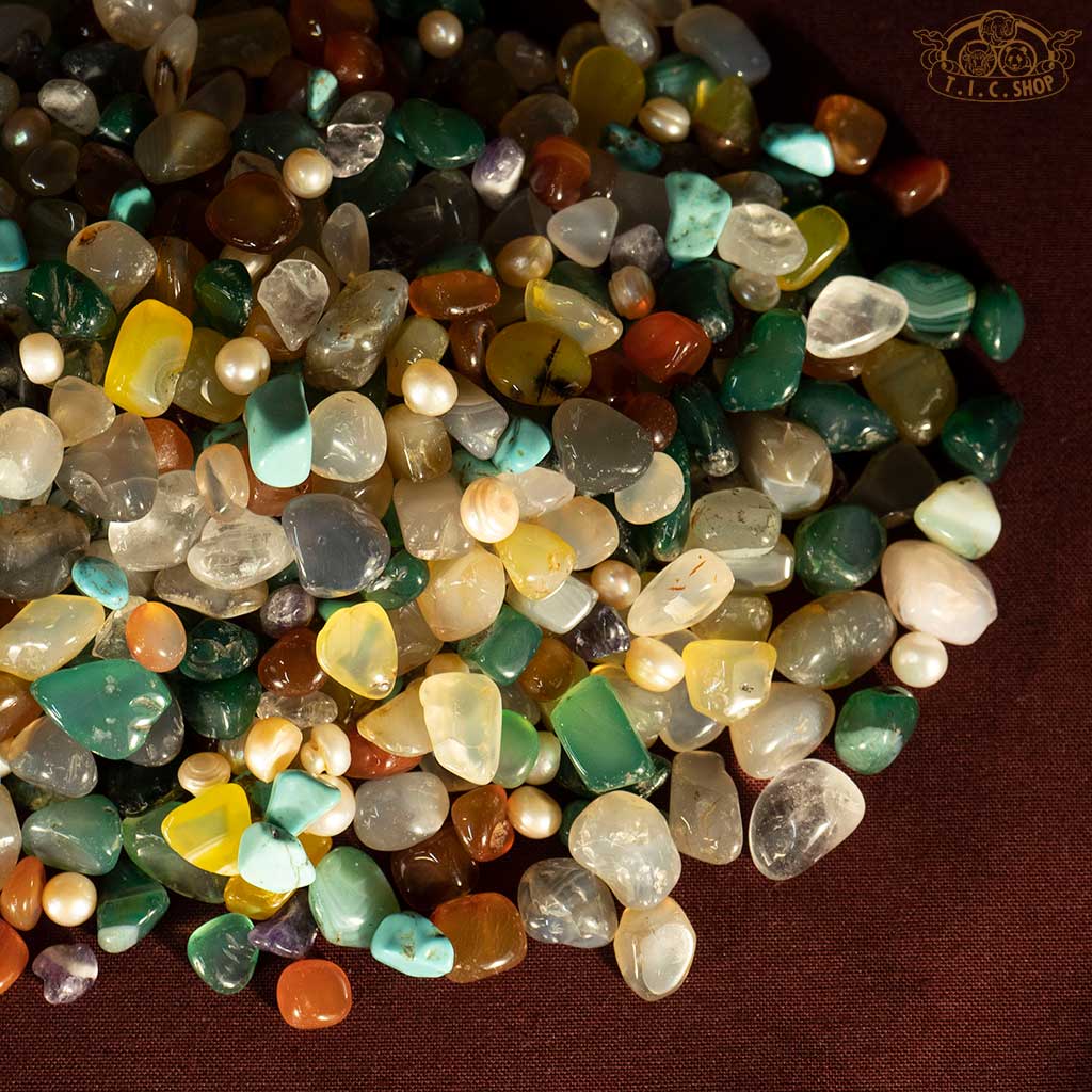 Auspicious Stones for Mandala Offering, 500g pack including agate, pearls, imitation turquoise, and a silver bead, for spiritual and ceremonial use.