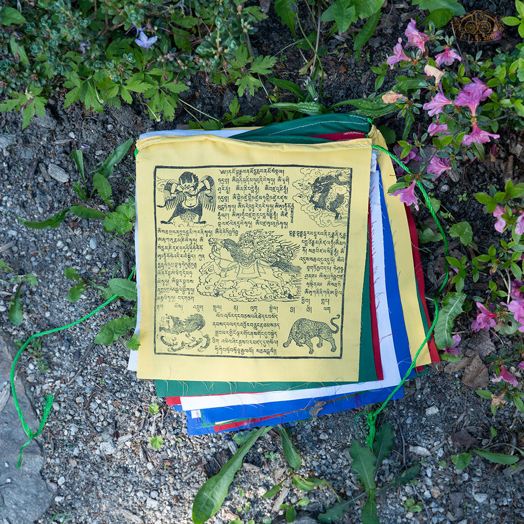Long string of 25 hand-printed cotton Windhorse prayer flags, each 28x32 cm, used for meditation and spiritual harmony