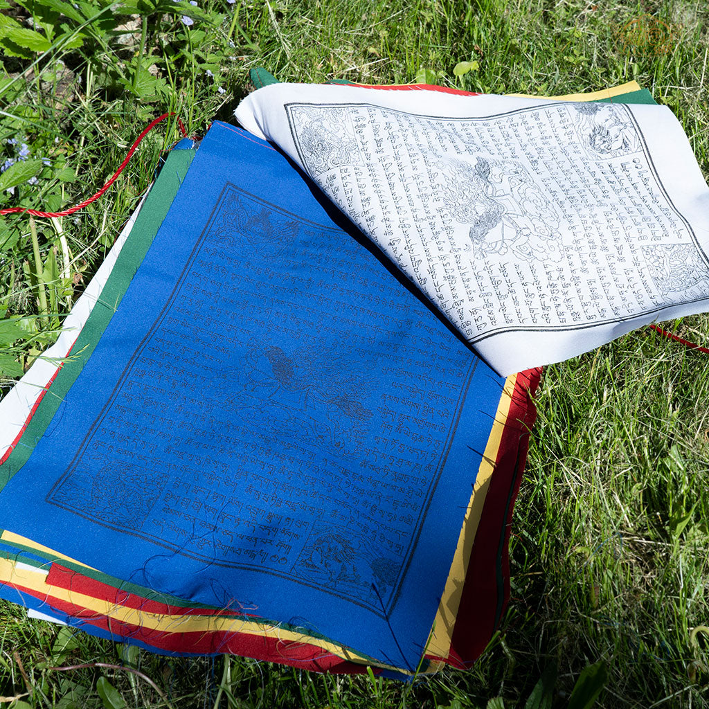 Detailed view of vibrant Tibetan Windhorse prayer flags made from cotton with traditional printed designs