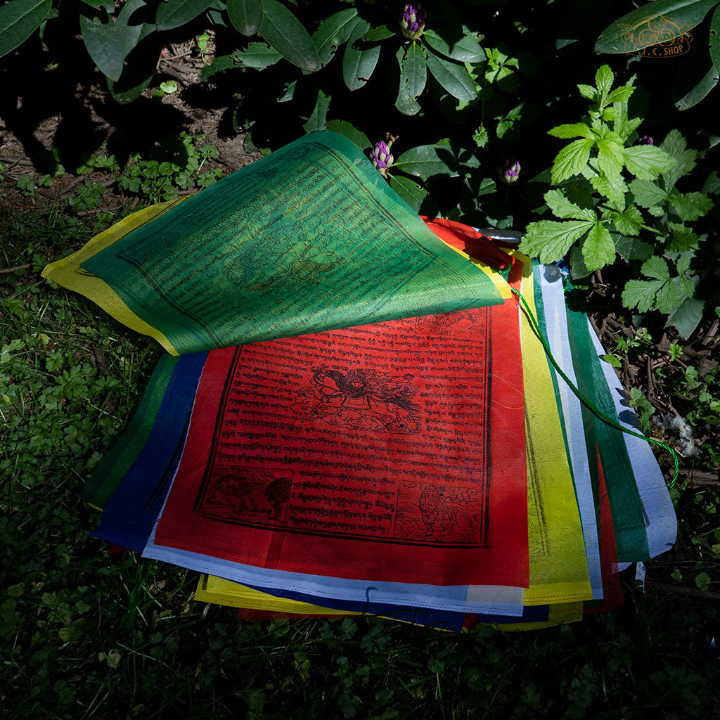 Close-up of colorful polyester Tibetan Windhorse prayer flag featuring traditional symbols for protection and positive energy